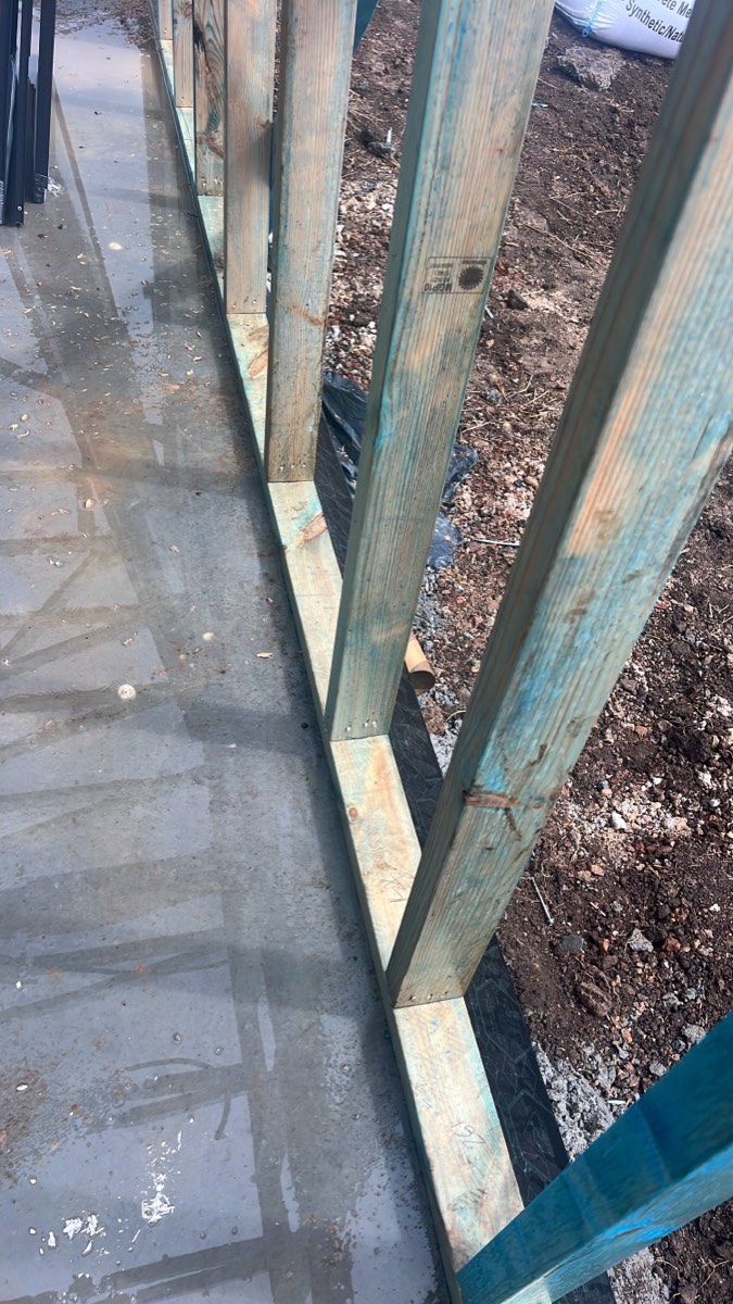 Bottom plate tie down at 600mm spacing, recorded at a frame inspection in Austral